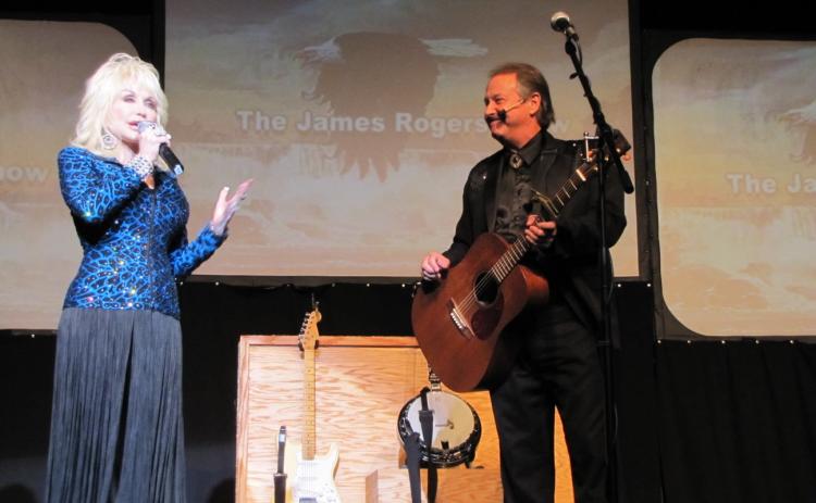 James Rogers performs with Dolly Parton