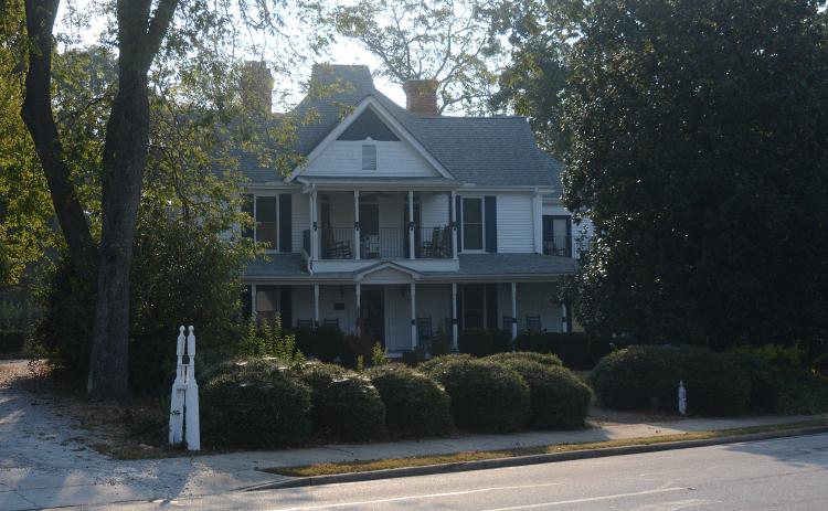 Sunshot by Michael Hall — The Skelton House on Benson Street is shown. The city’s zoning commission recommended last week that the city council deny a rezoning request that would open the door for a theater and event space there.
