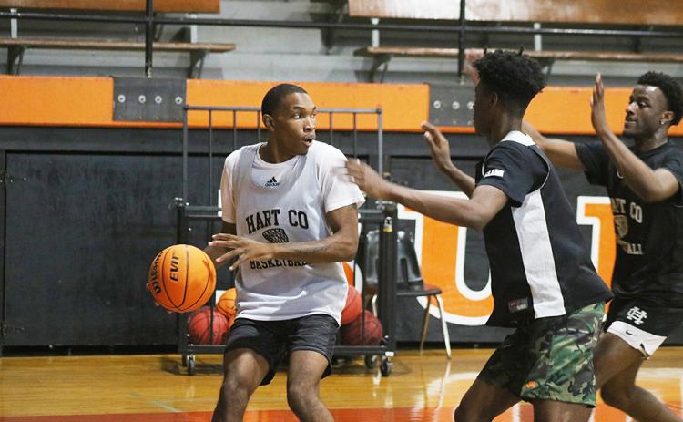 Sunshot by Grayson Williams — Shone Webb looks for a teammate to pass to during a practice drill on Oct. 29 at Hart County High School.