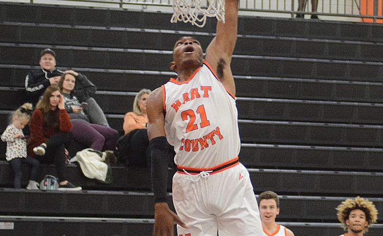 Shone Webb dunks during a scrimmage on Tuesday at Hart County High School.