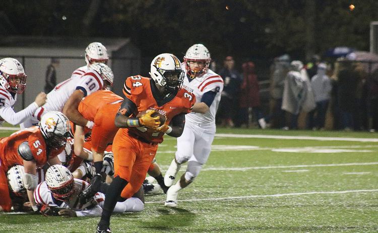 J.L. Lackey looks for running room against Haralson in the first round of the playoffs on Nov. 15 at Herndon Stadium.