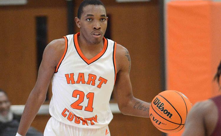 Hart County's Shone Webb brings the ball up court in a recent game at Hart County High School on Ensley-McCurley Court.