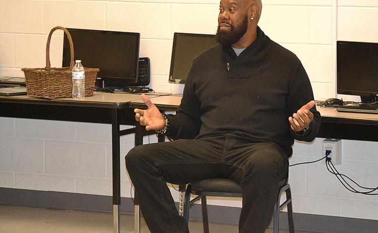 Sunshot by Drew Dotson - Former NFL offensive lineman and Royston native Tony Jones talks to students at the Hart County Alternative Program on Wednesday, Dec. 6.