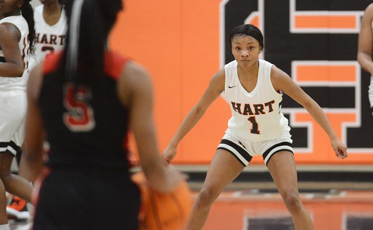 Sunshot by Michael Hall - Valasha Carter zeroes in on a Stephens County opponent on Jan. 24 at Hart County High School.