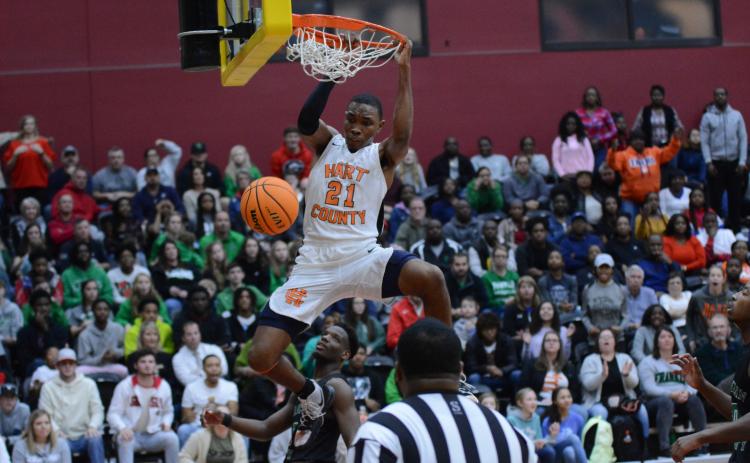Sunshot by Grayson Williams- Hart County’s Shone Webb dunks against Franklin County at Emmanuel College on Feb. 7.