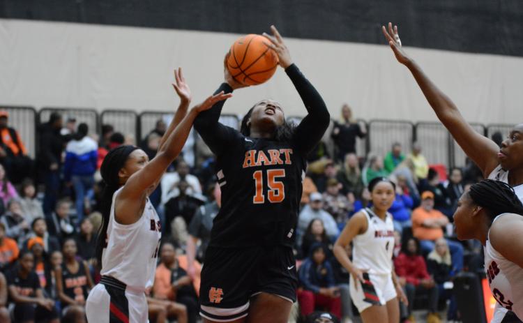Sunshot by Grayson Williams - Hart County’s Taniya Alexander puts up a shot against Franklin County at Emmanuel College on Feb. 7.