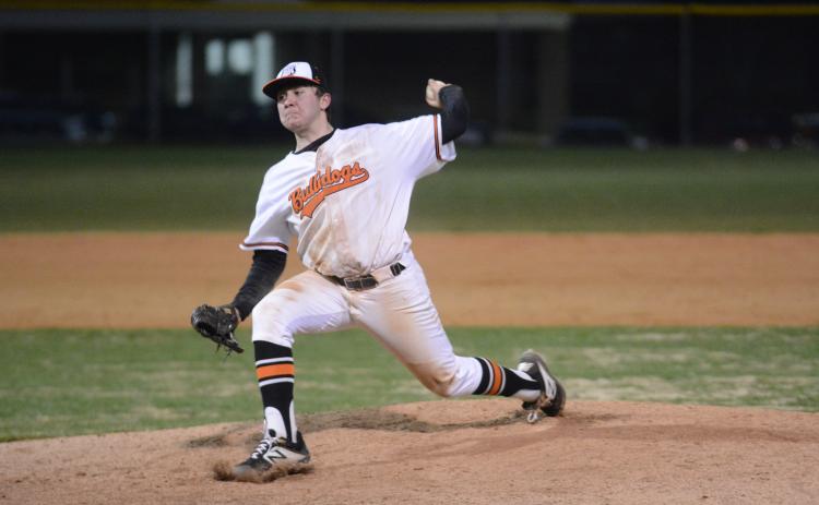 Sunshot by Grayson Williams - Hart County pitcher J.P. White deals from the mound Friday at Saye Field where the Bulldogs rallied to beat Stephens County 7-4.