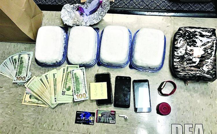 Photo submitted — Methamphetamine, cash, cellphones, and other items seized as part of a federal investigation are shown.