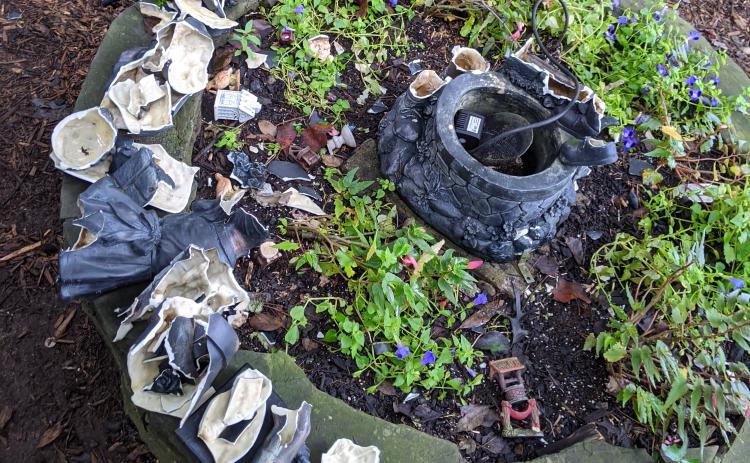 Photo submitted - A fountain in the Anne King Garden at the Hart County Botanical Garden is shown in pieces after recent vandalism.