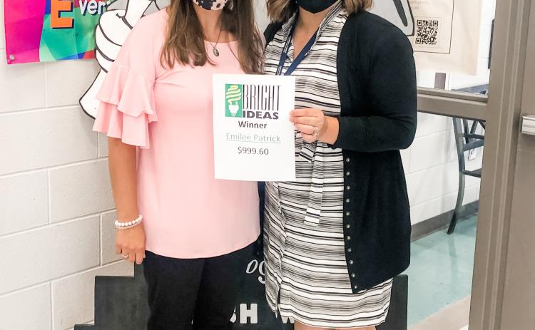 Photos submitted North Hart’s Emilee Patrick, above left, is pictured with principal Haley Smith.