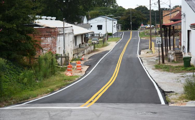 Railroad Street in downtown Hartwell is shown recently with fresh pavement and fresh lines. Sunshot by  Michael Hall