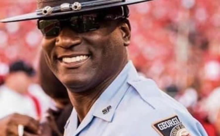 Photo submitted O’Neal Saddler is pictured on the field during a security detail at a University of Georgia football game.