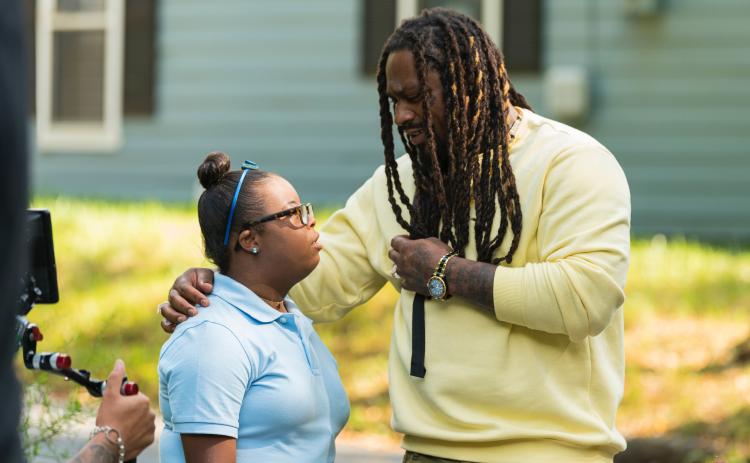 Photo submitted Hartwell’s Taylor Freeman, left, acts in a scene of “Artistic,” a short film, with former NFL running back Marshawn Lynch
