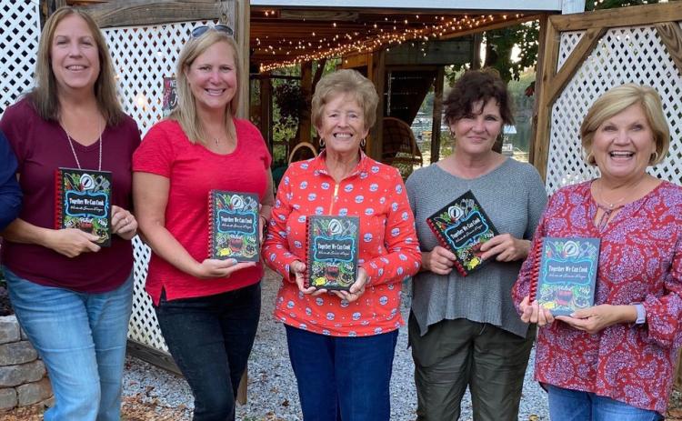 Photo submitted - Hartwell Service League members from left to right, Dixie Northrup, Suzee Northrup, Kay Cleveland, Debra Kennedy and Beth Mewborn, show off the service league’s cookbook, now on sale.
