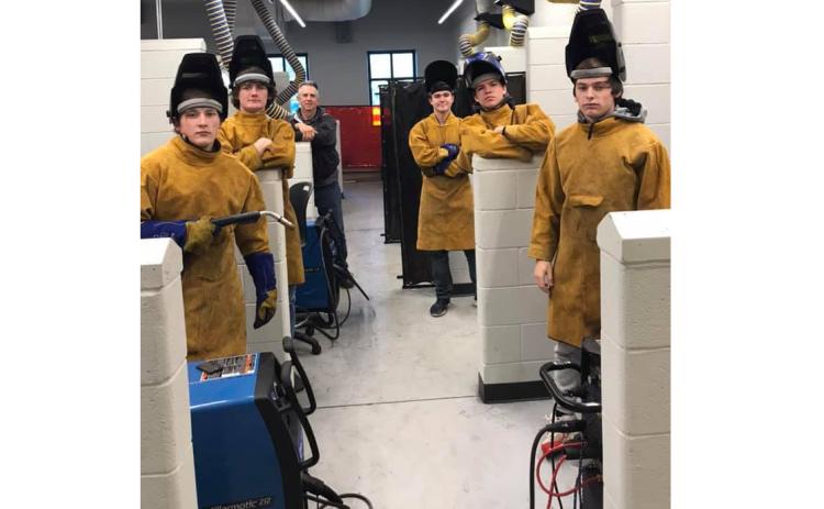 Photo submitted — Hart County High School welders who earned their technical college certification in welding through a class taught by Mike Carey at Hart College and Career Academy pose for a photo recently.