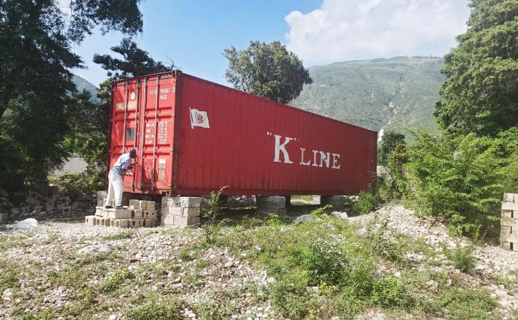 Photo submitted - The first container of medical supplies shipped to Haiti by local ministry Love Him Love Them is shown in Haiti.