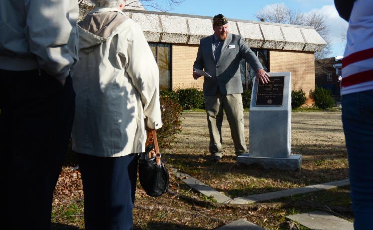Patrick Wireman rededicates the VFW Auxiliary memorial at Veterans Memorial Park on the Hart County Courthouse Square on Friday, Feb. 19.