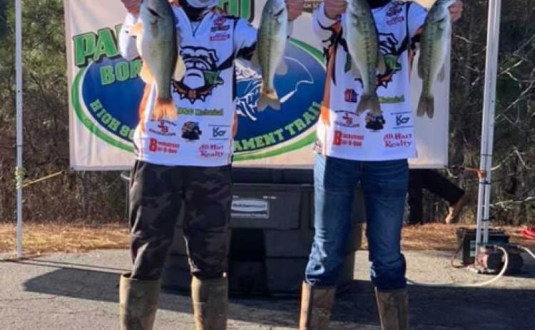 Max Heaton and Tallis Morrison, below left, individually captured second place in the tournament with five fish totalling 11.7-lbs.