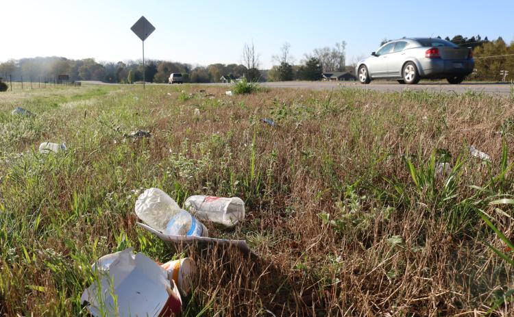 Sunshot by Grayson Williams - Litter on the side of state route 77 is shown. Officials are hopeful prison work crews will return soon to help clean up sides of roadways for the first time in more than a year.