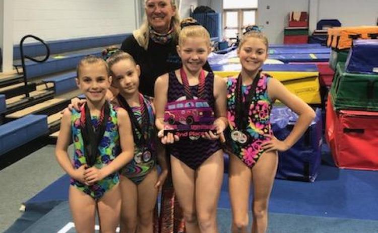 Pictured from left to right, front, are Tinsley Starrett, Aeryn Back, Chastyn Haynie, Bella Beck, back, head coach Shellye Ayers.