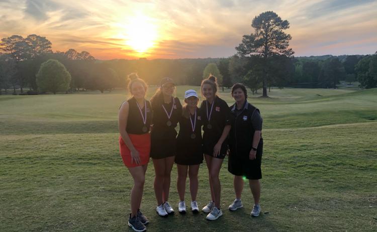 Photo submitted Pictured from left to right are Hart County High School girls’ golf team members Ashlyn Stanton, Mary Elizabeth Jackson, Lauren Weaver, Ella Franklin and head coach Wende Peloquin at the area tournament on Monday in Monroe.