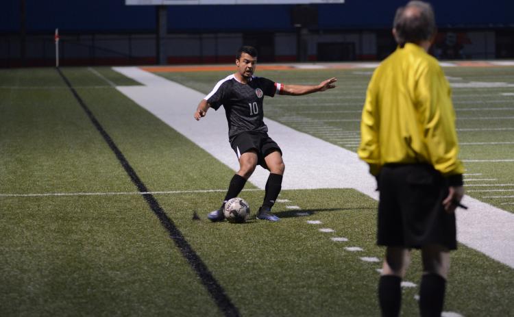 Sunshot by Grayson Williams Renso Escobedo fires a pass in the Bulldogs’ 8-1 senior night victory over Lincoln County on Friday, April 16 at Hart County High School.