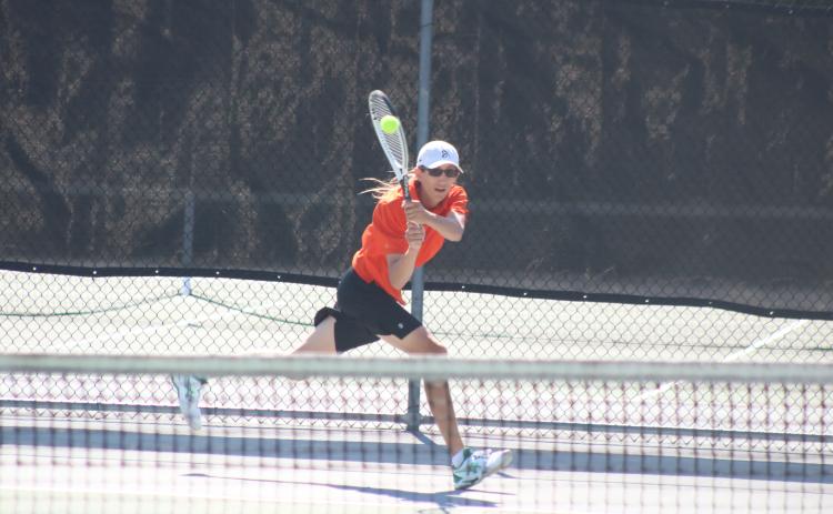 Grayson Williams/The Hartwell Sun C.J. Jorensen returns a serve against Sandy Creek at Hart County High School in the Racket Dogs’ first-round playoff victory on April 19.
