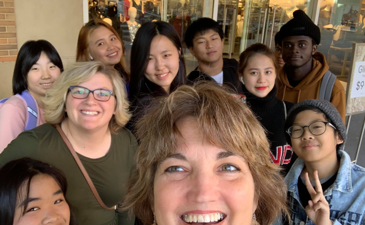 Submitted photo - International students travel to Atlanta once a quarter to take turns eating from their home cuisines. Pictured are front row from left to right: Hong Pham, Nealie Peeples, Sarah LeCroy and Wischut Pichayakiatikul. Back row from left to right: Yejean Woo,  Chau Nguyen, Mie Tanaka, Seungseung Choi, Nhi Bui and Sebastien Charles.