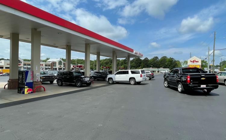 Drew Dotson/The Hartwell Sun - Drivers swarmed to Ingles in Hartwell Tuesday afternoon when the gas station restocked on gasoline, which they had run out of earlier in the day.