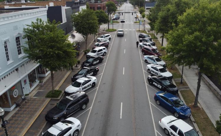 Submitted photo - Hartwell police line both sides of Howell Street near Southern Hart Brewery on June 2.