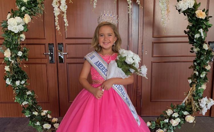 Submitted photo - Andie Jane Holmes grins after being crowned ‘National Young Miss in Atlanta on June 12.