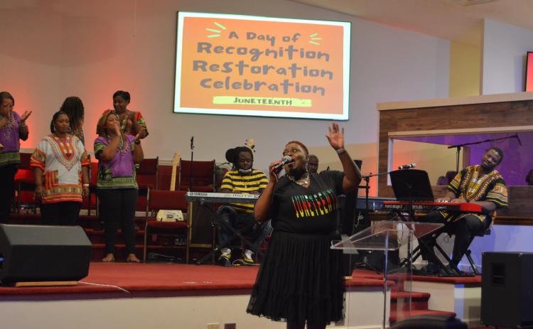 Drew Dotson/The Hartwell Sun - The Juneteenth Celebration Choir leads a Juneteenth praise service at the Christian Worship Assembly on Saturday.