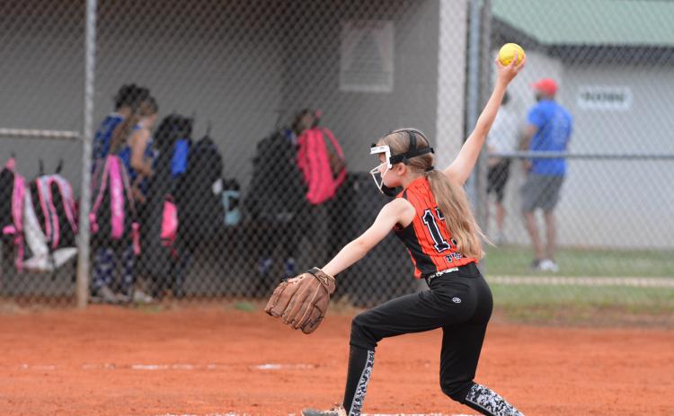 Drew Dotson/Hartwell Sun - Briella Pierce winds up the pitch against Oconee County.