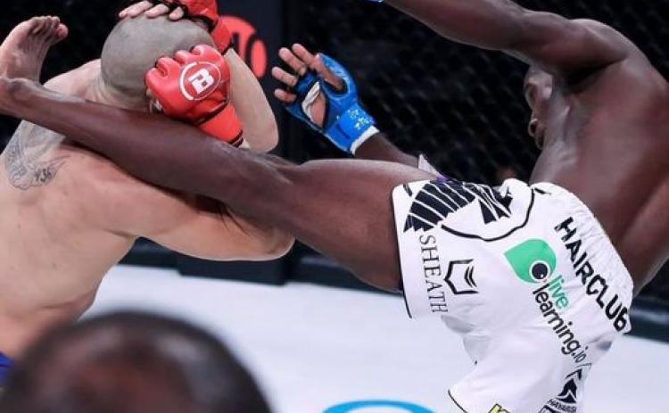 Photo submitted - Hamilton lands a kick on his Matheus Mattos at his first main card event for Bellator.