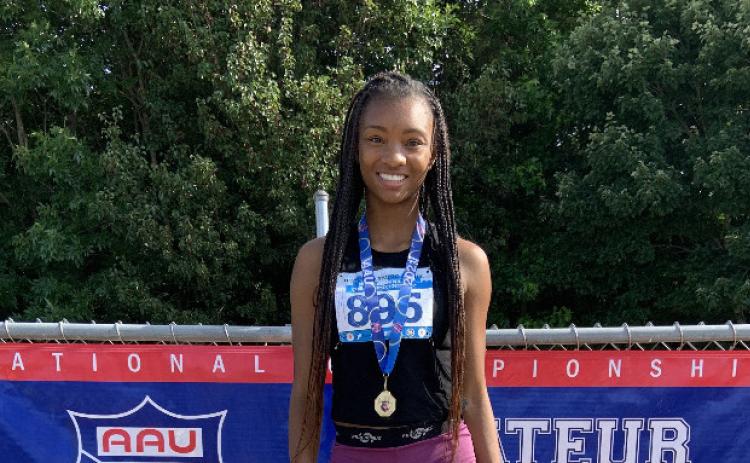 Valasha Carter won first in the triple jump and sixth place in the long jump.