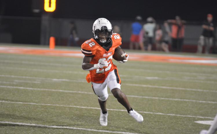 Drew Dotson/The Hartwell Sun - Sophomore running back Nori Moore finds space on the outside in Hart County’s first half against BHP.