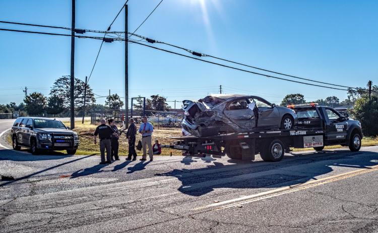 First responders converse at the scene of a Monday wreck along Reed Creek Highway in Hartwell.