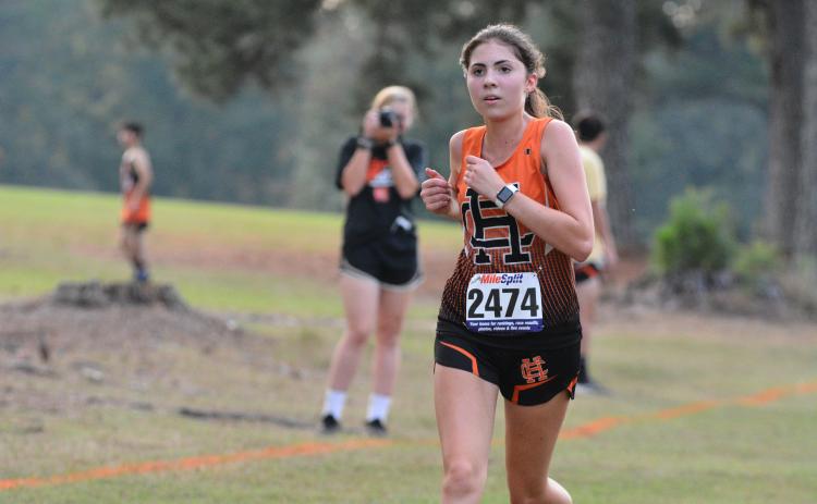 Melody Bloomberg eyes the finish line in Hart's home meet Sep. 30.