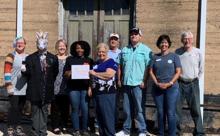 Pictured left to right are HCCT and TORCH board members Lani Sessoms, Morgan Haymes (Harvey), Kerri Prutt, Ayoca Freeman,  Mary Gidley, Christopher Milford, Lenford Smith, Kristin Joyner and Larry Torrence.