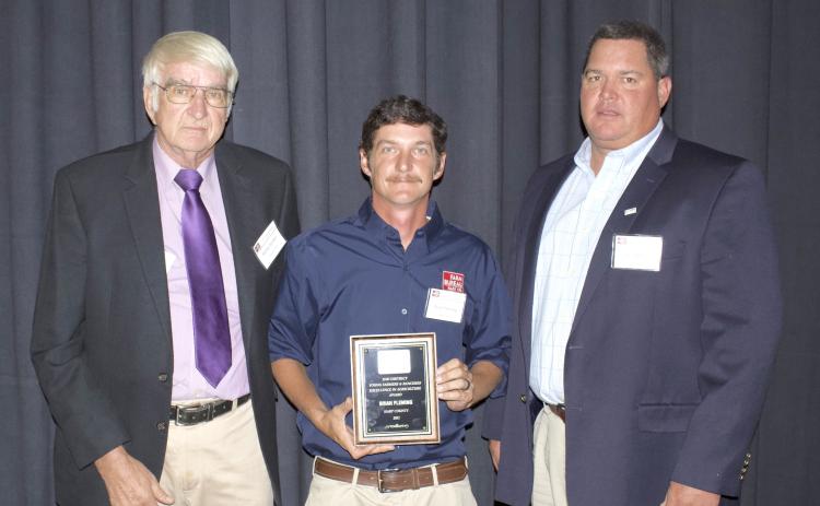 Fleming receives his award in September.