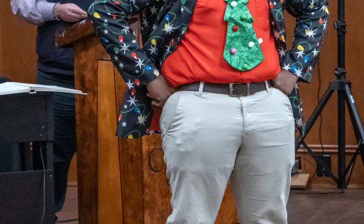 Pictured left: singer Rickey Eberhardt belts out a solo.