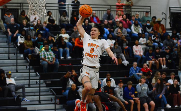 Johnny Curry slams down a dunk in the team’s 63-49 win over Stephens County on Friday, Feb. 4.