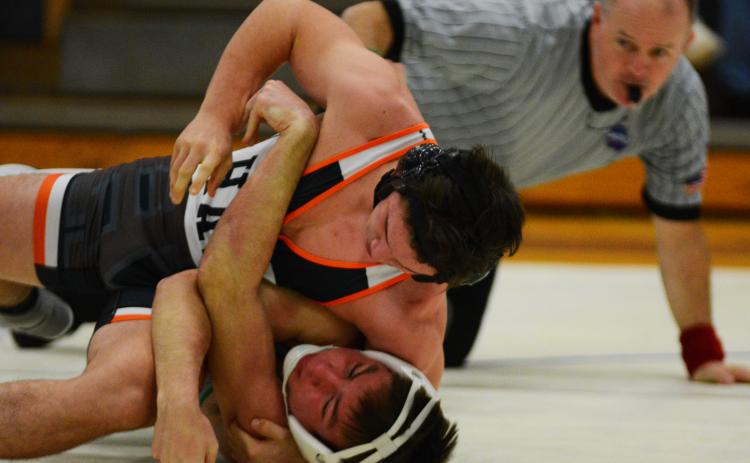 AJ Smith takes control of his Franklin County opponent at the region dual meet in Watkinsville on Jan. 8.