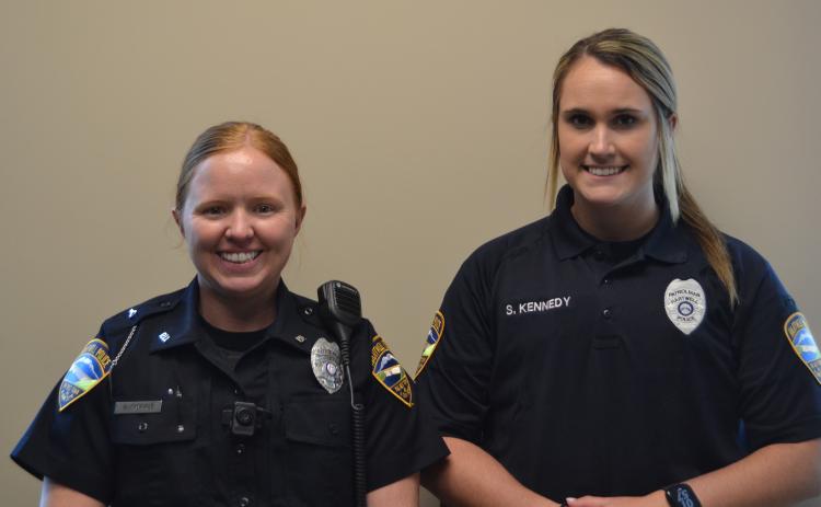 New officers Brittany Morris, left, and Summer Kennedy,