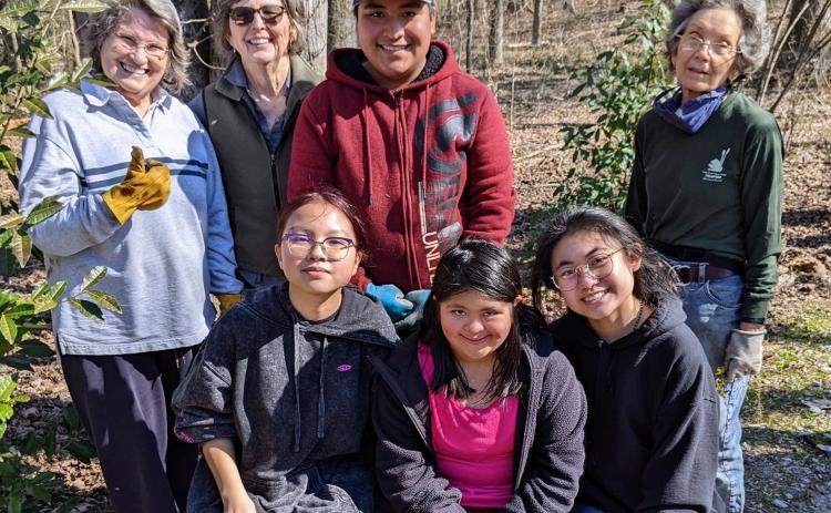 (Back L-R) Group leader Jeannie Brownsberger, garden volunteer Vickie Peace, Ulises Orbe and garden volunteer Ellen Forbus.