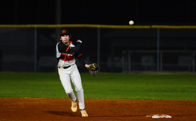 Zach Dombrowsky throws a runner out in the win over Banks County on March 1.