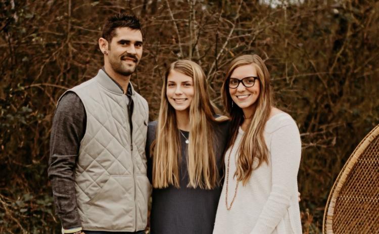 Colt Bennett, daughter Madison, and wife Kayla Bennett.