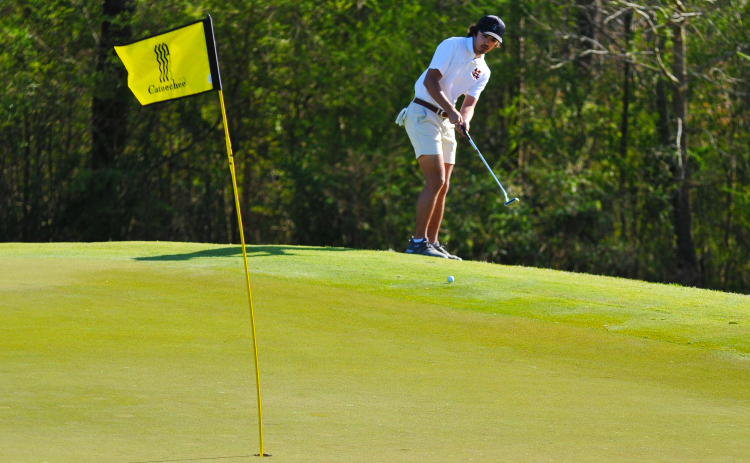 Payne Oglesby makes his approach in the match against Oconee County on March 24.