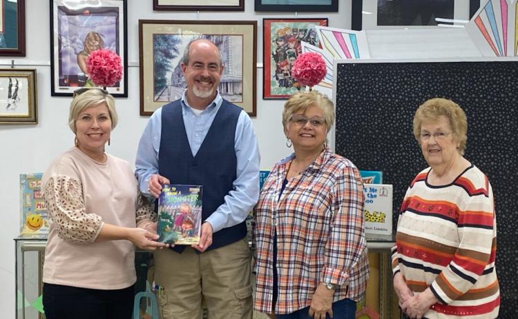 Pictured is Angie Brown, Hart EMC Director of Public Relations, Richard Sanders, (center) Director of Hart County Library, Tina Simmons and Linda Haley, (right) Hart County Farm Bureau.