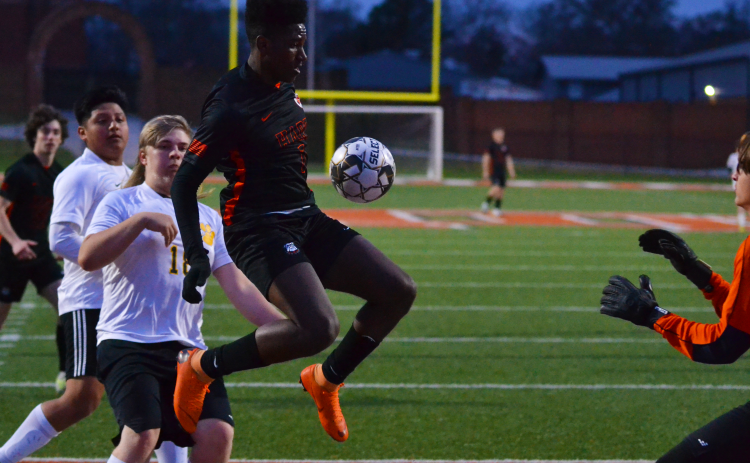 Chaston Lewis flies through the air in a match against Crescent earlier this season.